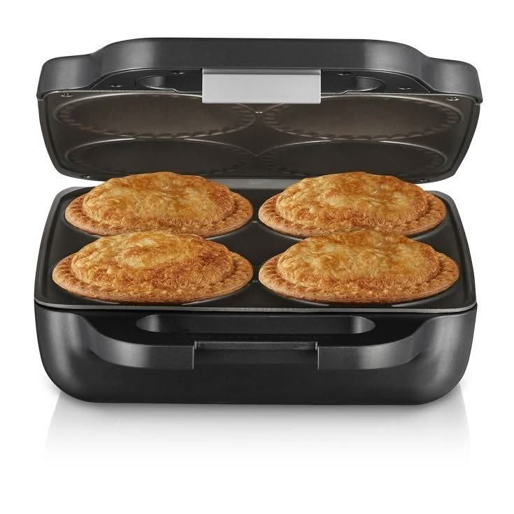 Sunbeam Pie Magic Traditional 4 Up electric pie maker on a plain background